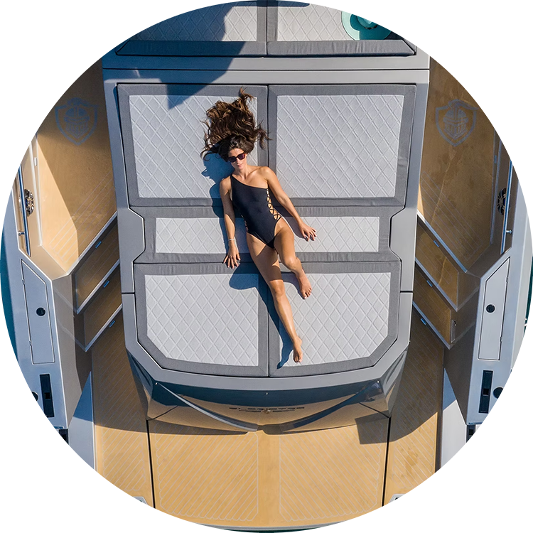 Lady laying down on surrounded by DECK-X boat decking