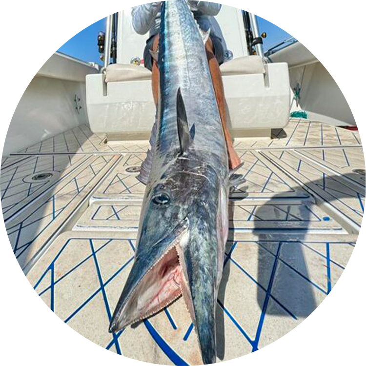 Fisherman showing off their catch on DEKit's Evercor marine flooring 